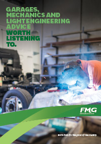 cover page showing welder in workshop 
