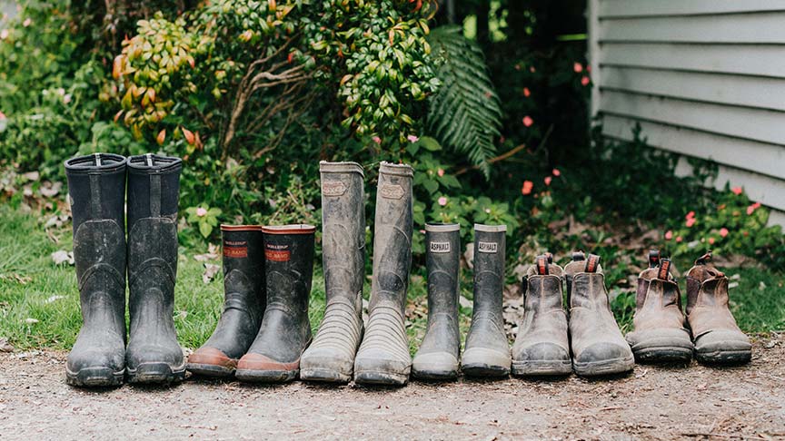 gumboots lined up in a row 