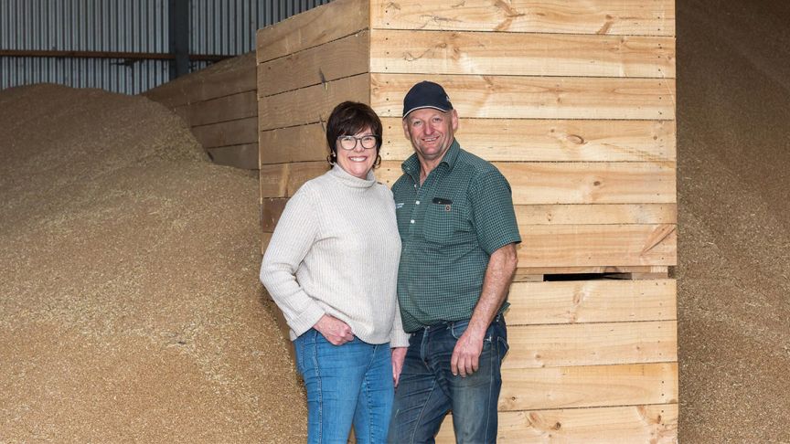 Brian and Rachel Leadley standing in grain silo 