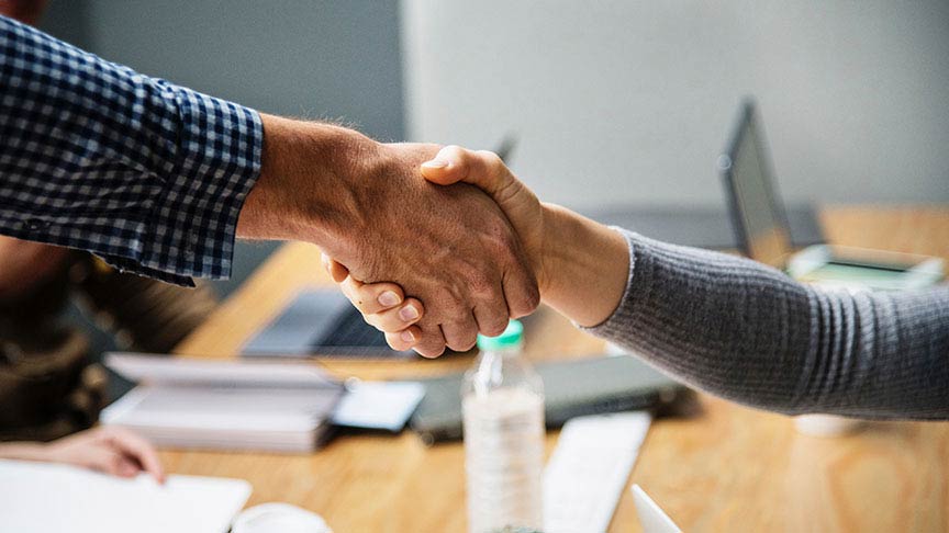 close up of a handshake