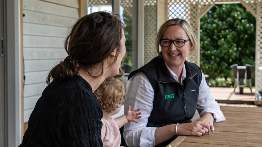 FMG employee with client 